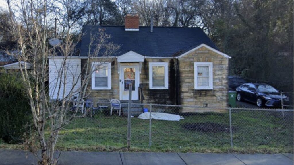Existing stone cottage in Charlotte, NC, site of a Hammerhead Capital duet scrape and build project